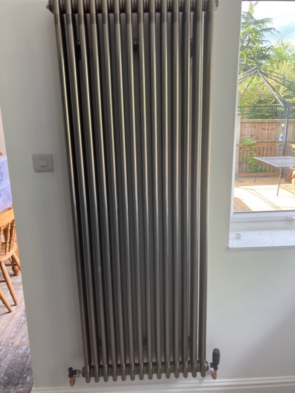 Tall graphite feature radiator installation