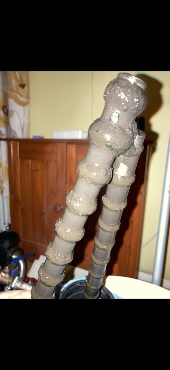 Magnetic sludge removed during a MagnaCleanse heating flush