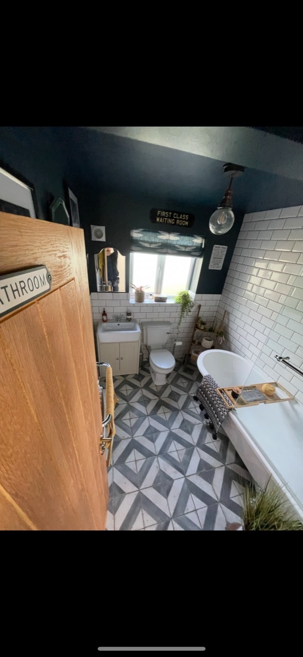 Traditional bathroom renovation with metro tiles, patterned floor and bath
